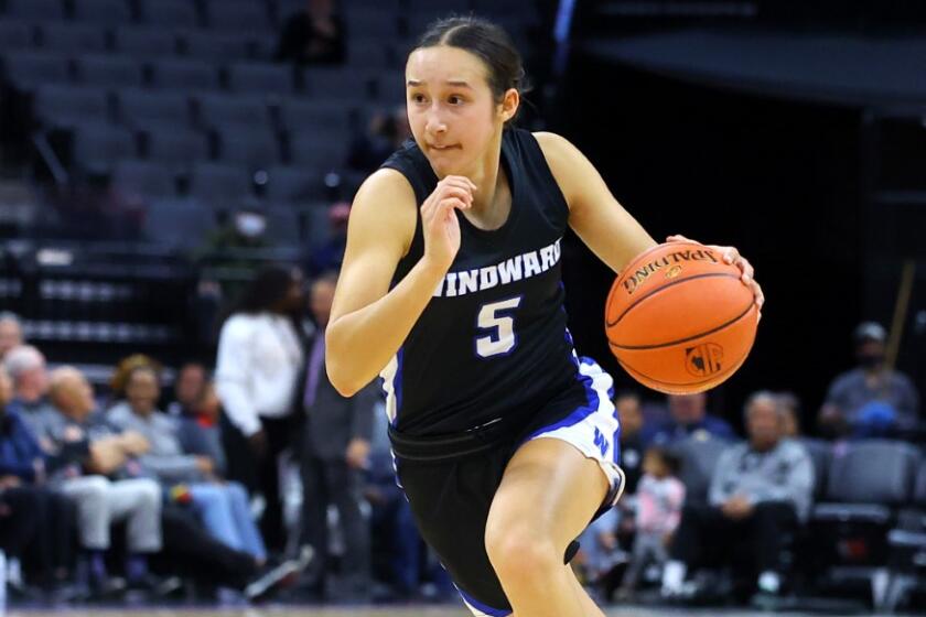 Skye Belker of Windward dribbles in the CIF state Division I girls' final on Friday night at Golden 1 Center.