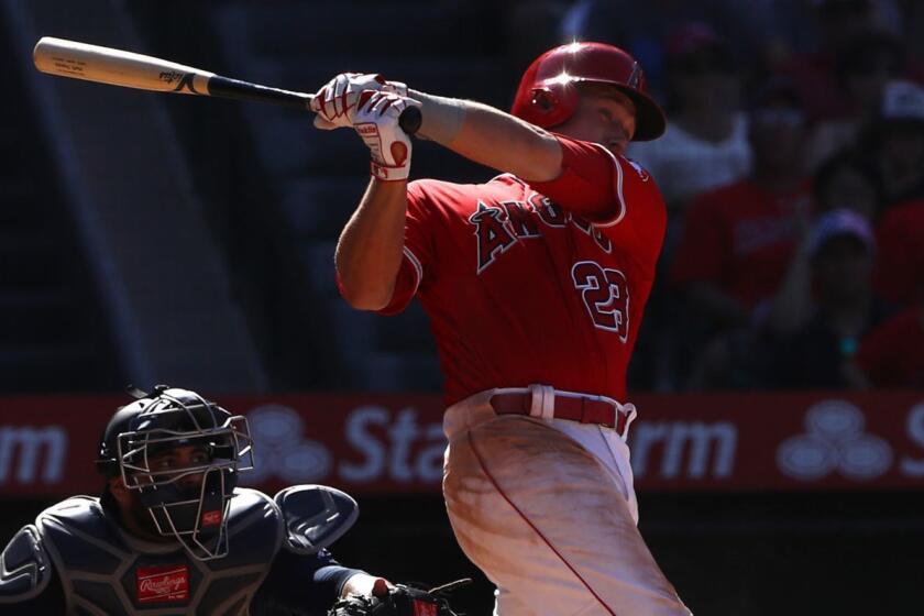 ANAHEIM, CALIFORNIA - JULY 14: Matt Thaiss #23 of the Los Angeles Angels hits a three-run home run in the eighth innning during the MLB game against the Seattle Mariners at Angel Stadium of Anaheim on July 14, 2019 in Anaheim, California. (Photo by Victor Decolongon/Getty Images) ** OUTS - ELSENT, FPG, CM - OUTS * NM, PH, VA if sourced by CT, LA or MoD **