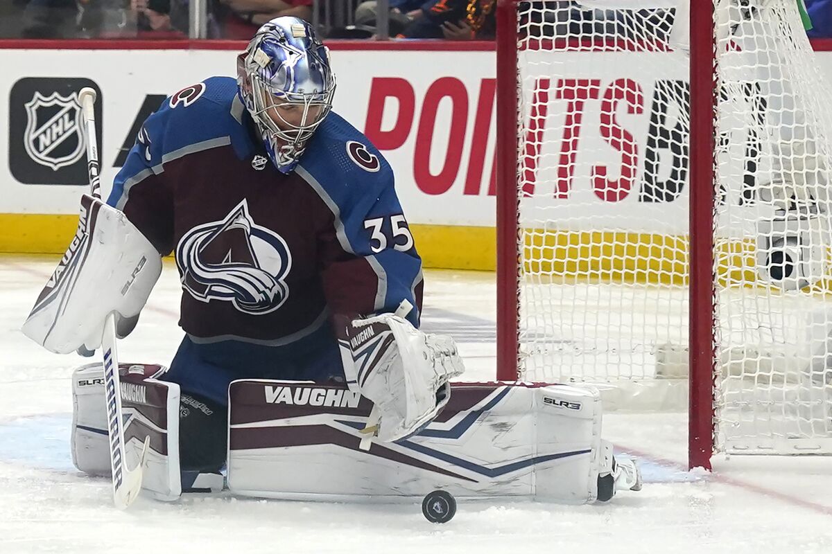 Colorado Avalanche goaltender Darcy Kuemper makes a save against the Edmonton Oilers during the second period in Game 1 of the NHL hockey Stanley Cup playoffs Western Conference finals Tuesday, May 31, 2022, in Denver. (AP Photo/Jack Dempsey)
