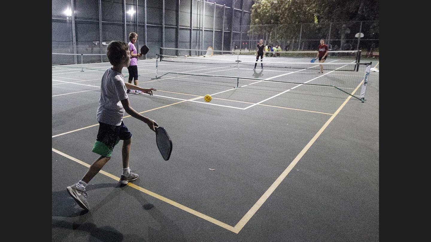Photo Gallery: Larry Maxam Park pickleball enthusiasts angle for control of tennis court