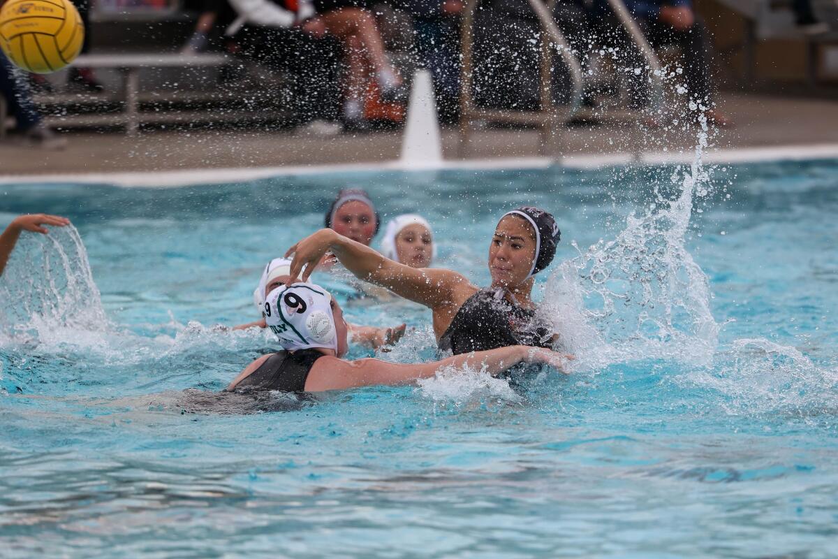 Huntington Beach High senior Maddy Scarth takes a shot against Long Beach Poly on Nov. 30, 2022.