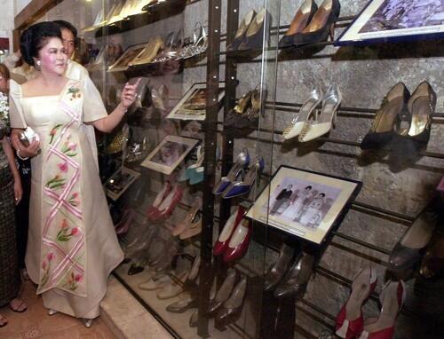 After a popular revolt forced dictator Ferdinand Marcos and his wife, Imelda, to flee the Philippines in 1986, officials were astounded to find more than 1,200 pairs of shoes owned by the former first lady. Imelda Marcos gained notoriety for shopping trips to the world's swankiest boutiques, glitzy parties and lavish beautification projects in the midst of the Philippines' extreme poverty, the Associated Press wrote in 2001. The shoes became a symbol of extravagance and excess. In this photo, Imelda Marcos in 2001 was reunited with about 200 pairs of her shoes in the Marikina Shoe Museum, near Manila.