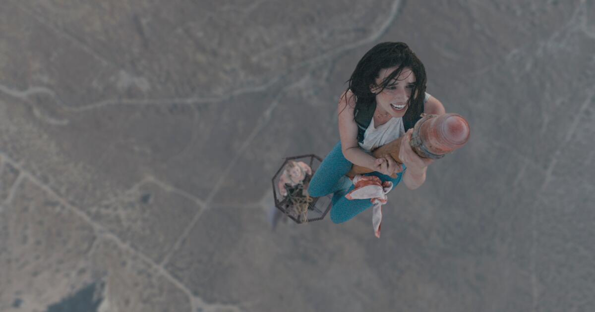 A hilarious  review shows a woman sliding down a mountain