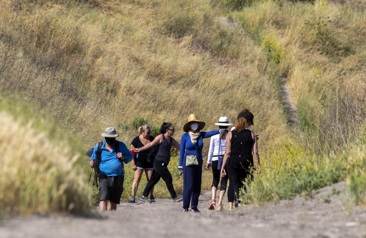 Hikers at Upper Las Virgenes Canyon Open Space Preserve on Saturday.