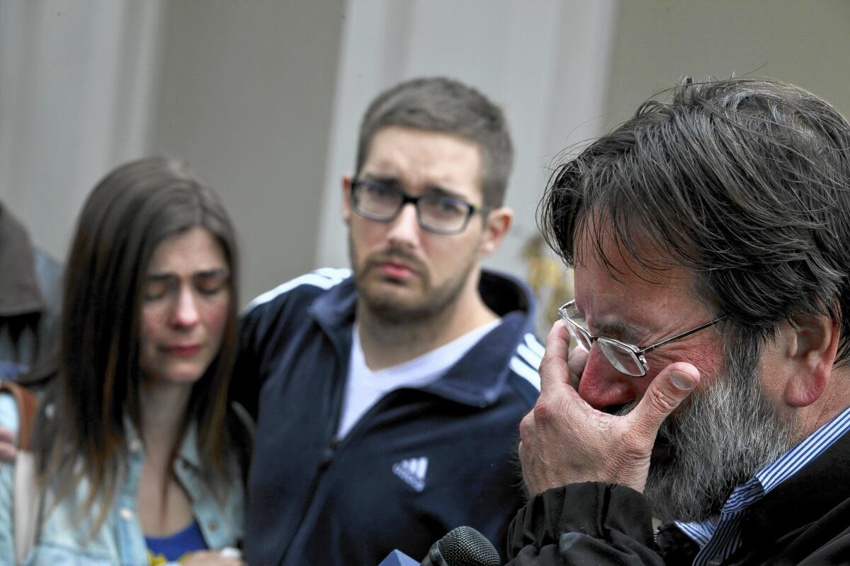 Richard Martinez, right, speaks with the media the morning after his son, Christopher Michaels-Martinez, was killed along with five other students in a rampage May 23 in Isla Vista, Calif.