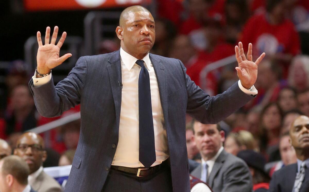 Clippers Coach Doc Rivers signals his team during Game 1 of the Clippers' playoff series against the San Antonio Spurs.