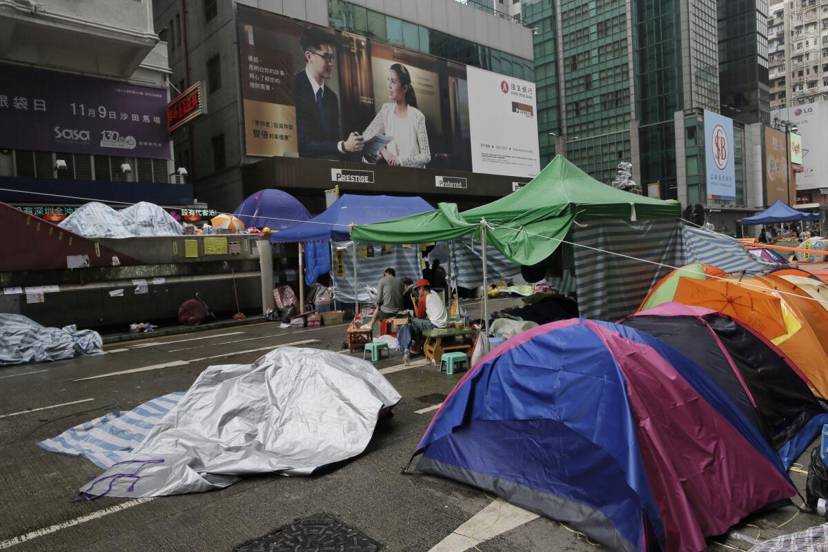 Tents set up by pro-democracy protesters are seen at a main road in the occupied area of the Mong Kok district in Hong Kong on Friday.