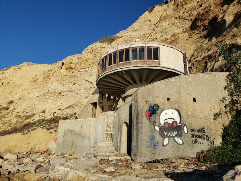 The "Mushroom House" at Black's Beach has been vandalized with graffiti recently.