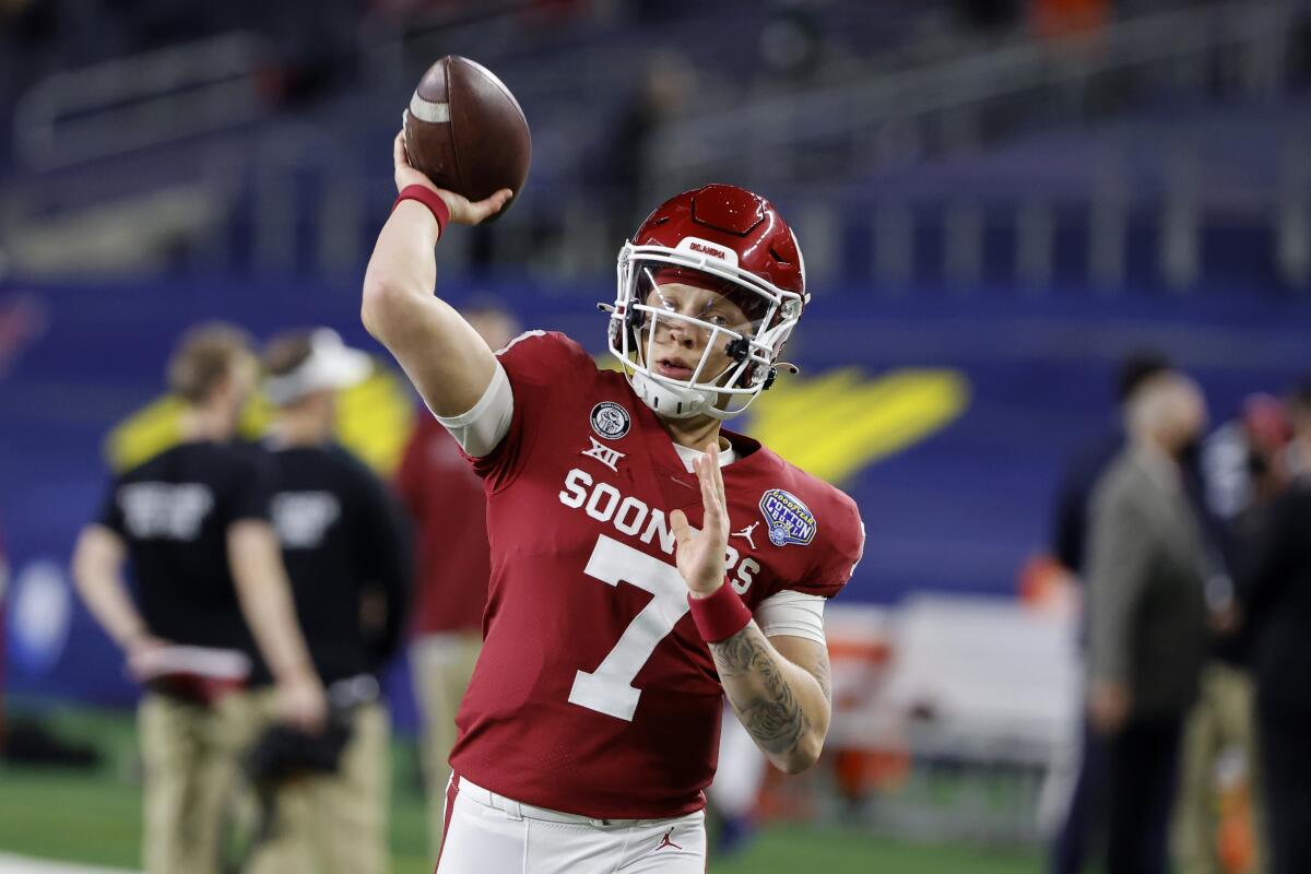 Oklahoma quarterback Spencer Rattler warms up before playing Florida in the Cotton Bowl.