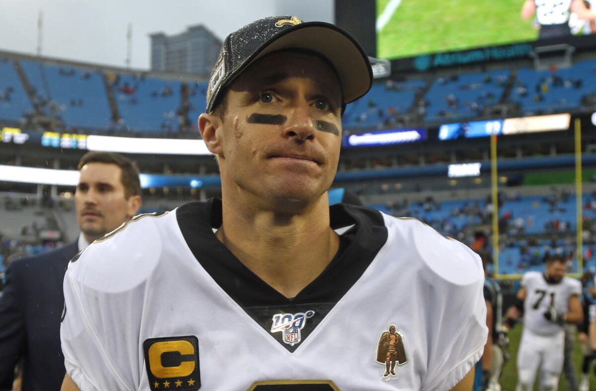 New Orleans Saints quarterback Drew Brees leaves the field following a game against the Carolina Panthers on Dec. 29