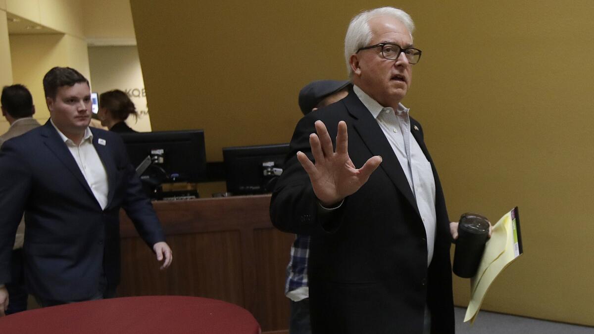 Republican candidate John Cox gestures toward reporters after a California gubernatorial debate with Democratic candidate Gavin Newsom at KQED Public Radio Studio in San Francisco on Oct. 8.