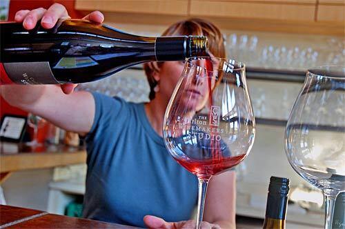 Oregon's Willamette Valley, an hour's drive from Portland, is the Pinot grape's home in the Northwest. Here, visitors can find about 275 wineries and a burgeoning number of restaurants, lodgings and tasting rooms. Pictured, Lynn Van Horn pours samples at the Carlton Winemakers Studio.