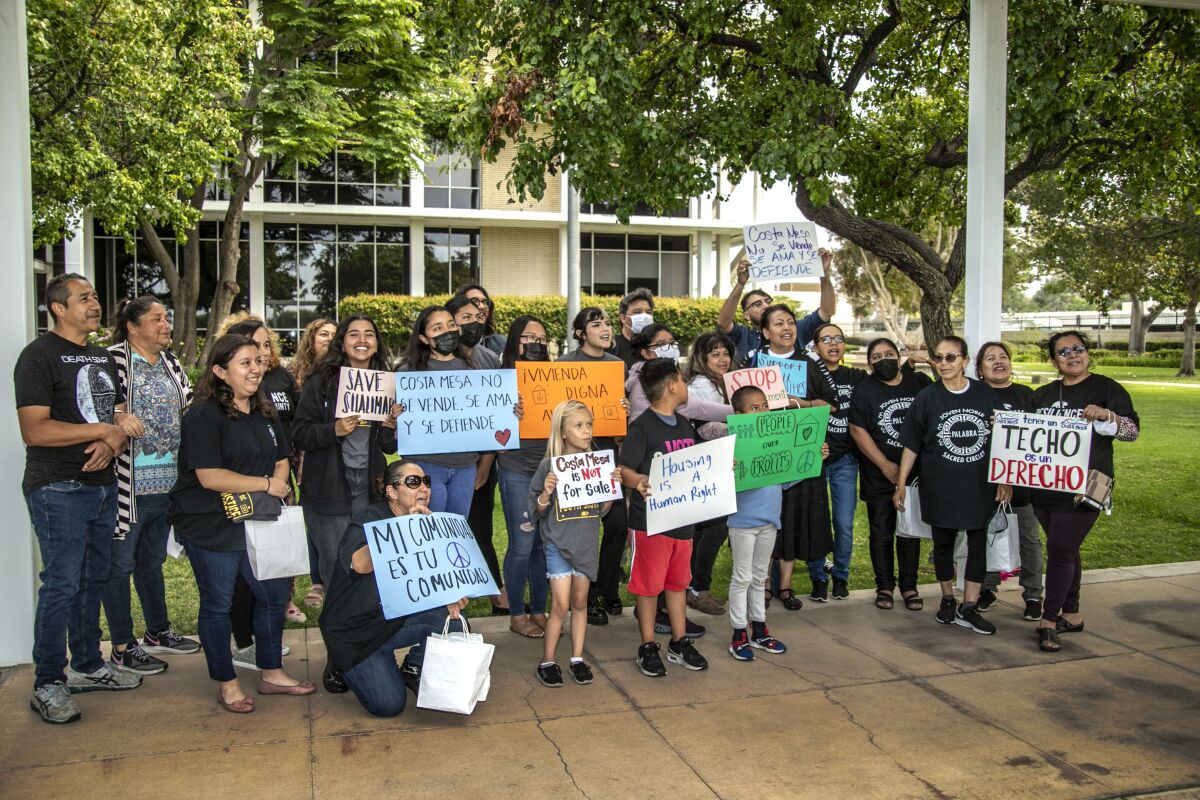 Demonstrators gather in front of Costa Mesa City Hall in June.