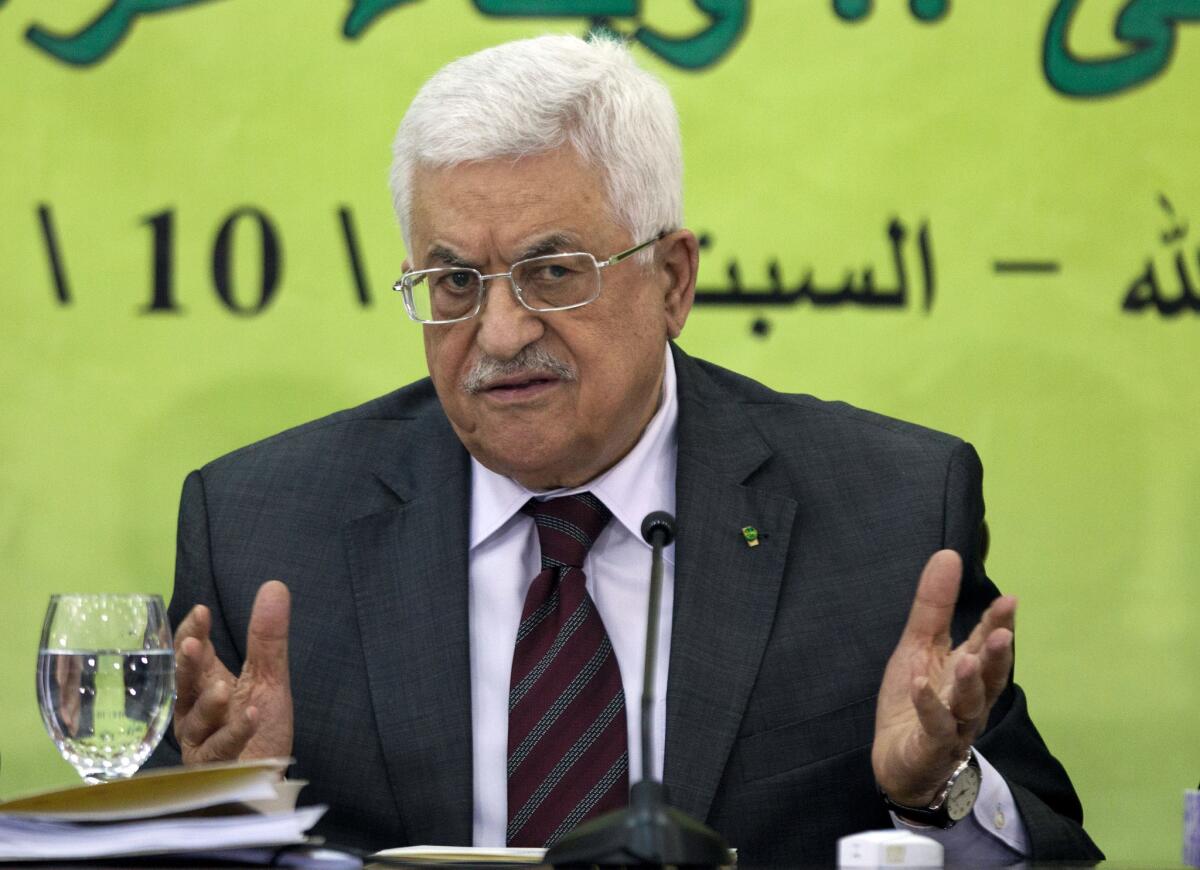Palestinian Authority President Mahmoud Abbas speaks during a meeting of the Fatah revolutionary council in the West Bank city of Ramallah on Oct. 18, 2014.