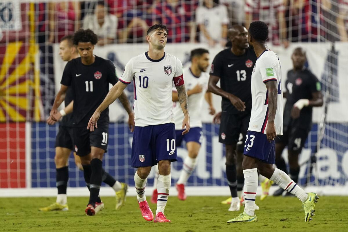 U.S. forward Christian Pulisic (10) reacts to missing a shot against Canada.