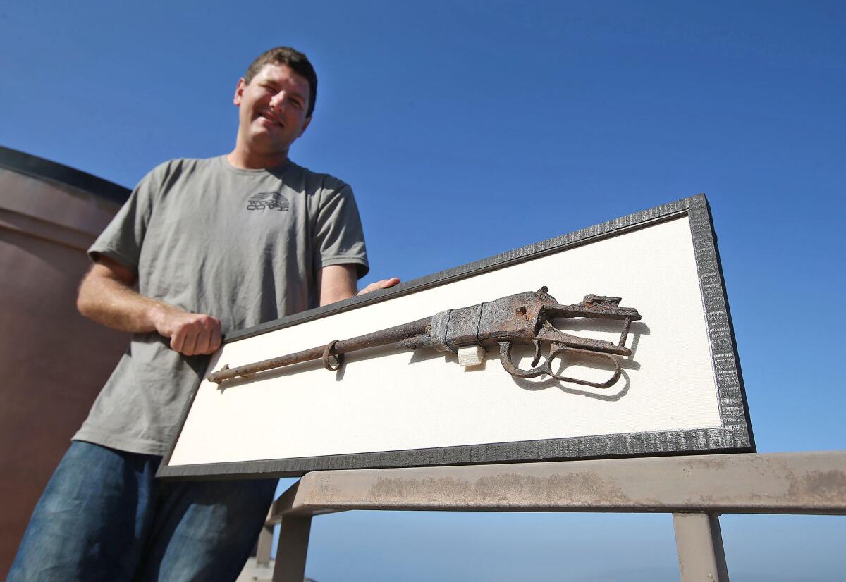 Joey Sammut found this old, rusted rifle buried by a hiking trail in Laguna Beach.