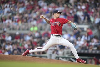 Atlanta Braves starting pitcher AJ Smith-Shawver delivers in the first inning of a baseball game against the Washington Nationals, Friday, June 9, 2023, in Atlanta. (AP Photo/Brynn Anderson)