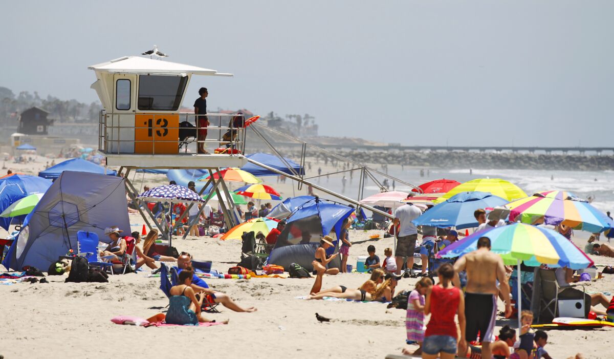 City lifeguards keep an eye on crowded Mission Beach in 2016
