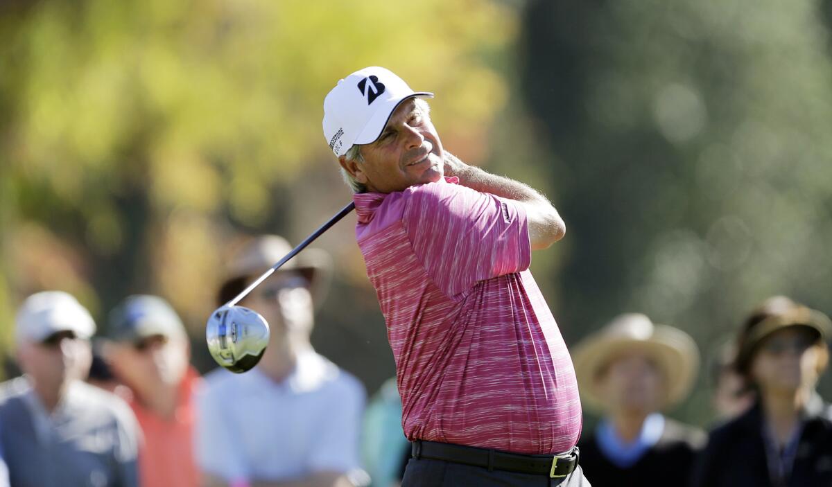 Fred Couples hits a tee shot on the second hole at the 2014 Northern Trust Open.