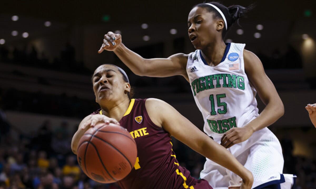 Arizona State guard Adrianne Thomas, left, and Notre Dame guard Lindsay Allen battle for a rebound during the Fighting Irish's 84-67 win in the second round of the NCAA tournament Monday.