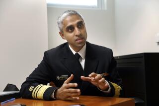 Los Angeles, California-Dec. 6, 2021-United States Surgeon General Vivek H. Murthy tours King/Drew Magnet High School of Medicine and Science before talking to a panel of students about mental health issues. United States Surgeon General Vivek H. Murthy announced a national youth mental health advisory to call attention to a situation that he considers to be a crisis among teens in the wake of the pandemic. (Carolyn Cole / Los Angeles Times)