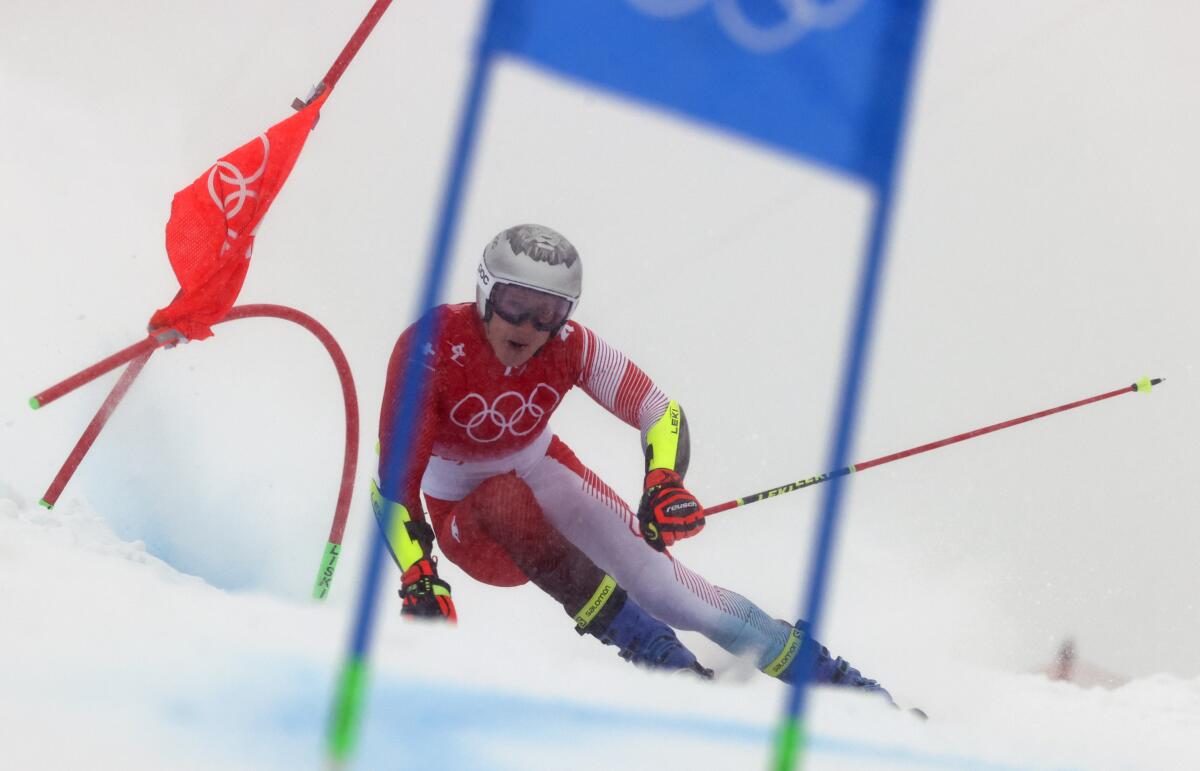 Marco Odermatt of Switzerland skis to the gold medal in the men's giant slalom.