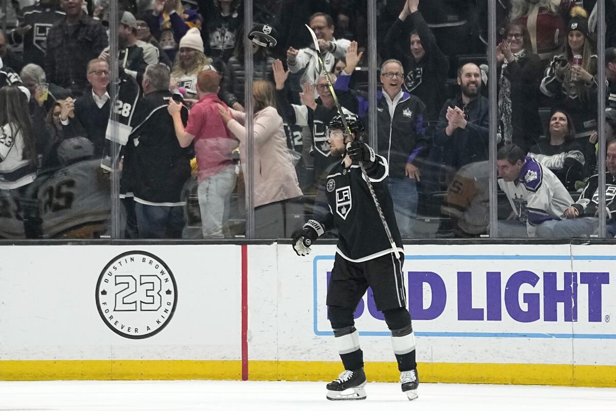 The Kings' Adrian Kempe celebrates his fourth goal during a 6-0 rout of the Pittsburgh Penguins on Feb. 11, 2023.