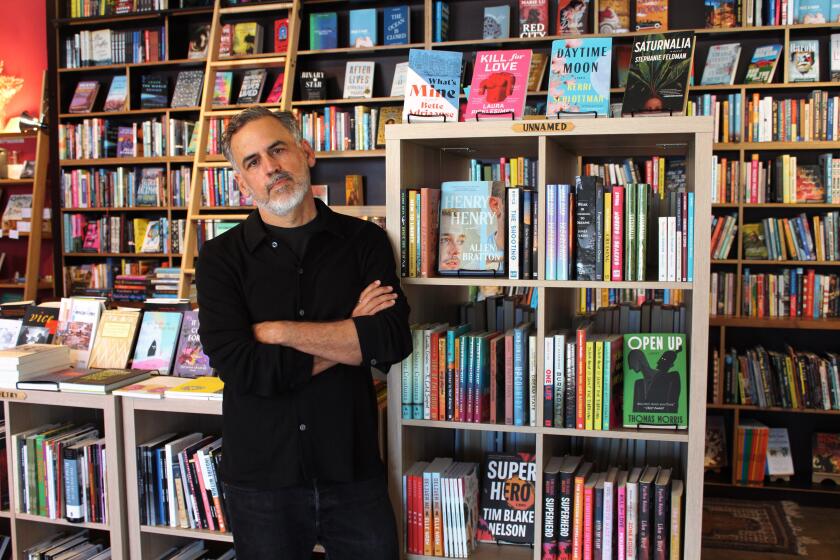 Unnamed Press' Chris Heiser in his Figueroa bookshop.