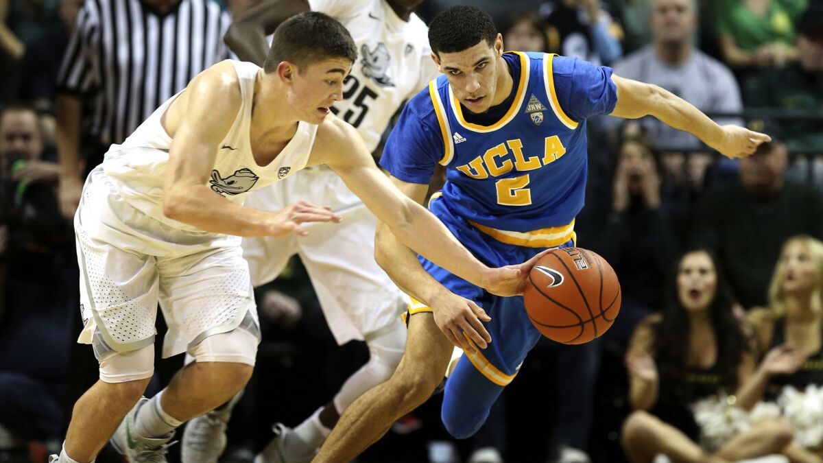 Oregon's Payton Pritchard forces a turnover by UCLA's Lonzo Ball during the first half Wednesday night.