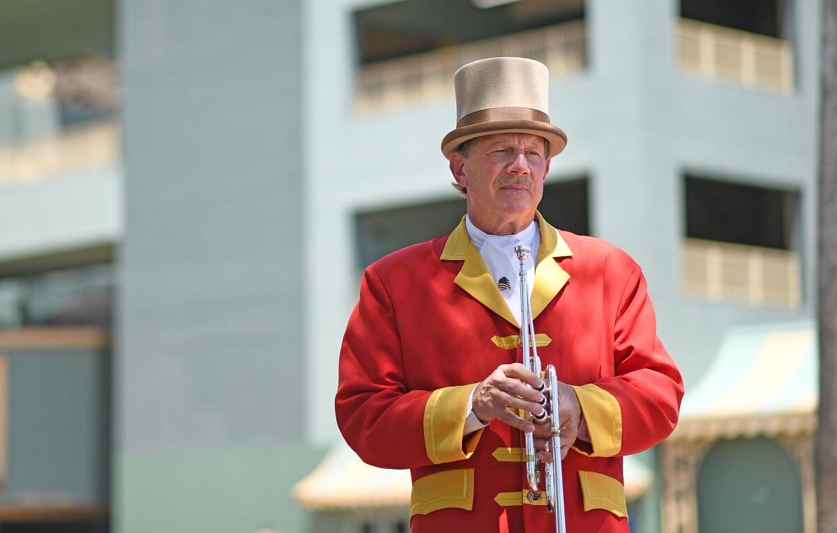 Bugler Jay Cohen is one of the essential workers at the Santa Anita Park racetrack during the coronavirus pandemic.