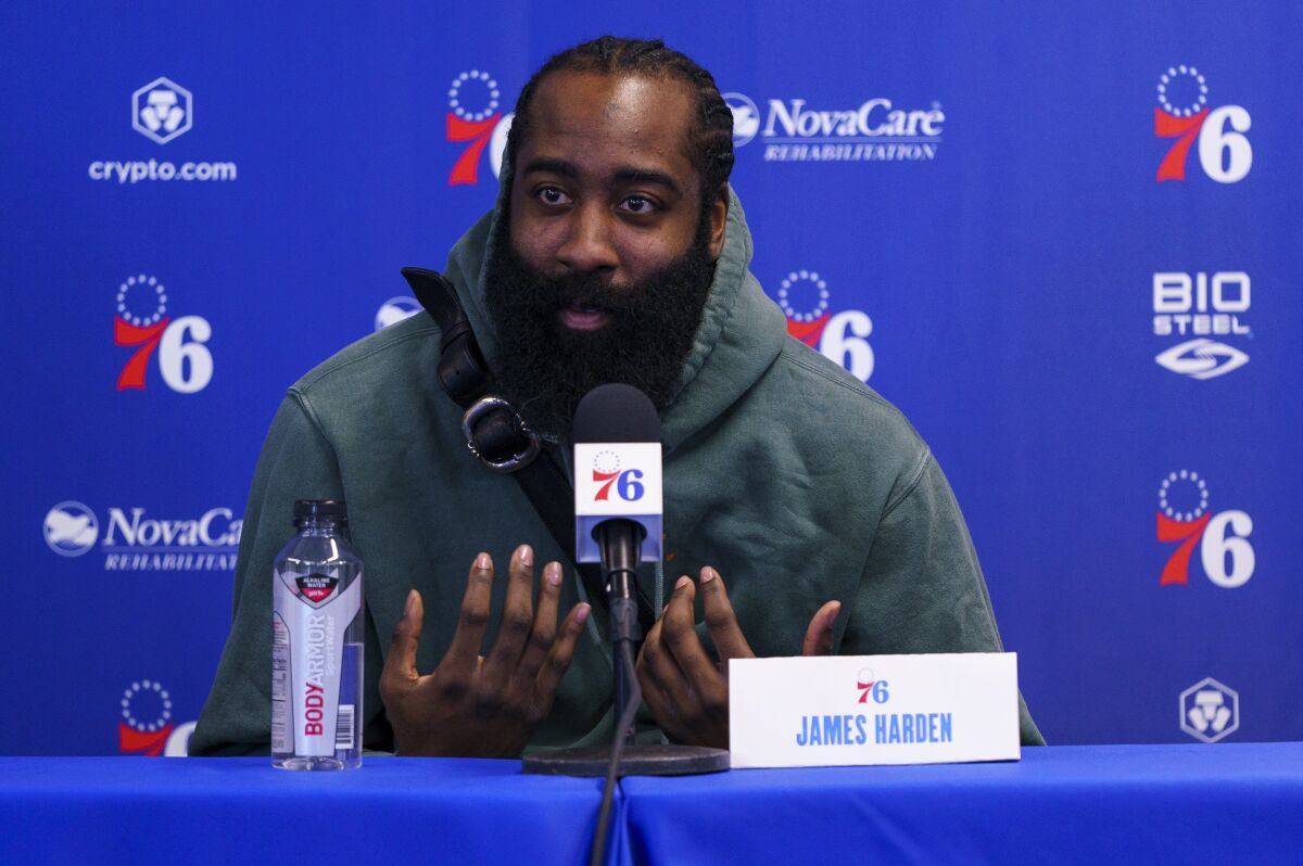 James Harden listens to a question from the media during a news conference Tuesday.