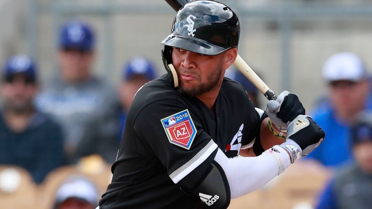 White Sox second baseman Yoan Moncada bats during a baseball spring exhibition game against the Los Angeles Dodgers, Friday, Feb. 23, 2018, in Glendale, Ariz.