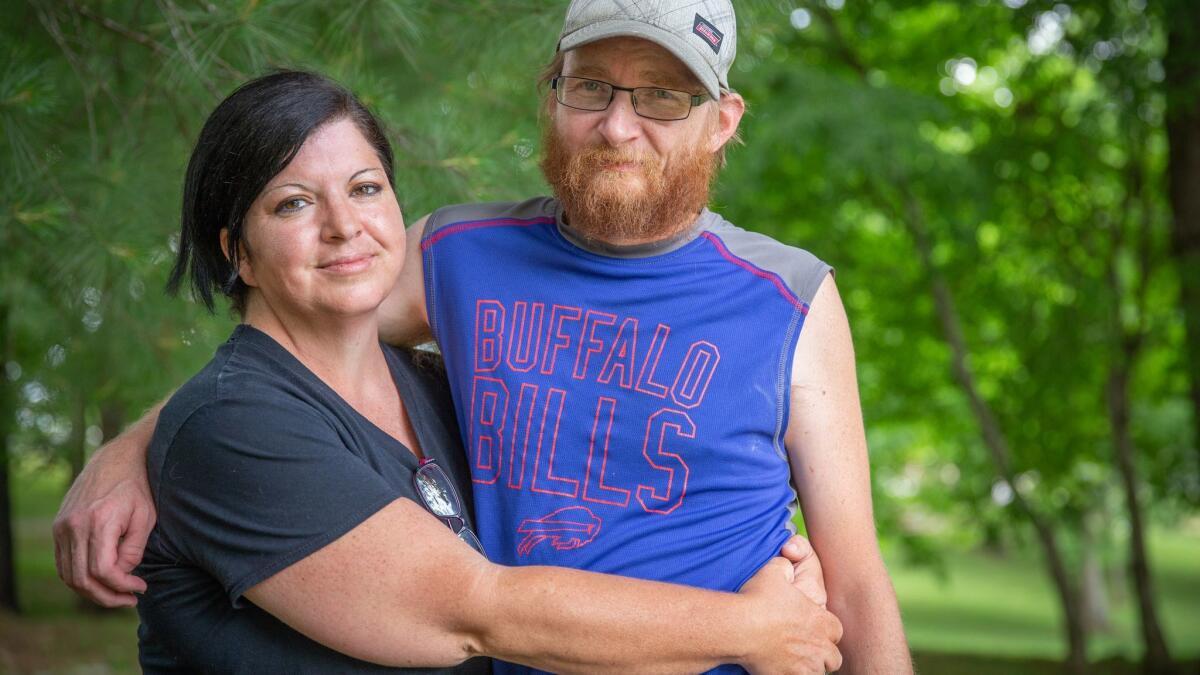 Wendy and Steve Matney. She has pleaded with her family not to call an ambulance and to wait for her seizures to pass. She says the expense is too great.