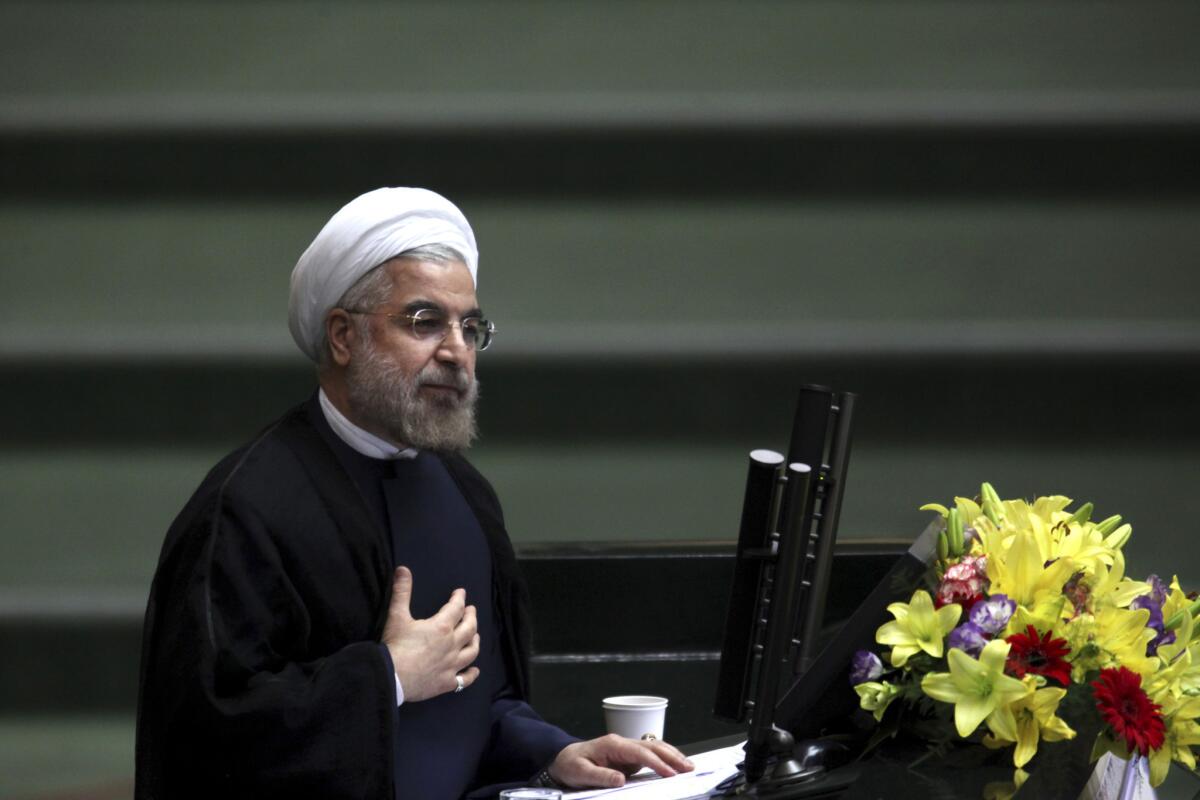 Iranian President Hassan Rouhani, shown here addressing parliament last month, told NBC News on Wednesday that Iran will never develop nuclear weapons.