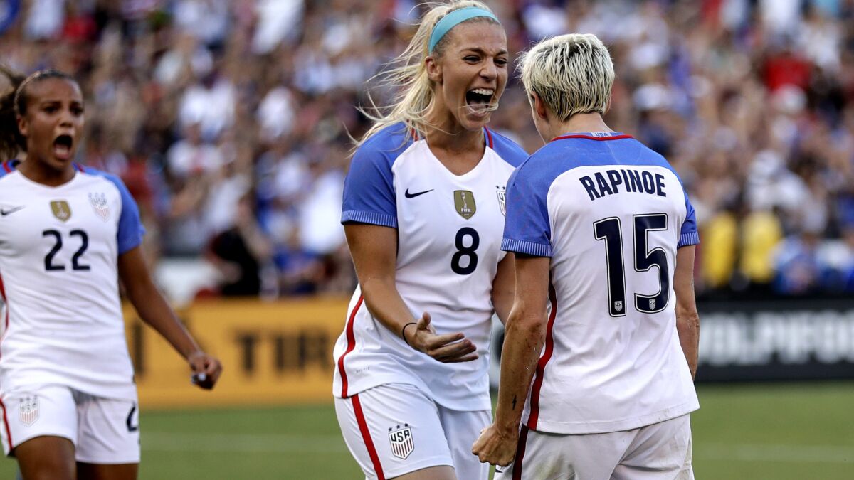 United States midfielder Megan Rapinoe is congratulated by Julie Ertz after scoring a goal against Brazil during ta Tournament of Nations game on July 30, 2017, in San Diego.