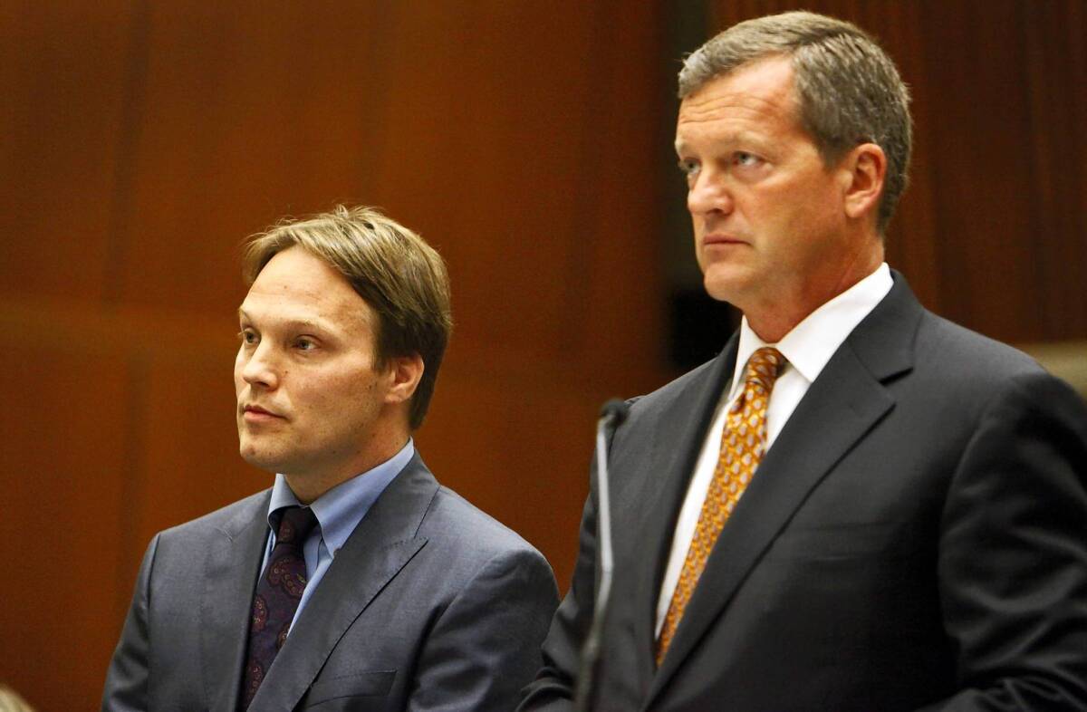 UCLA chemistry professor Patrick Harran, left, shown with defense attorney Thomas O'Brien in 2012, has been ordered to stand trial on felony charges stemming from a laboratory fire that killed staff research assistant Sheharbano “Sheri” Sangji more than four years ago.