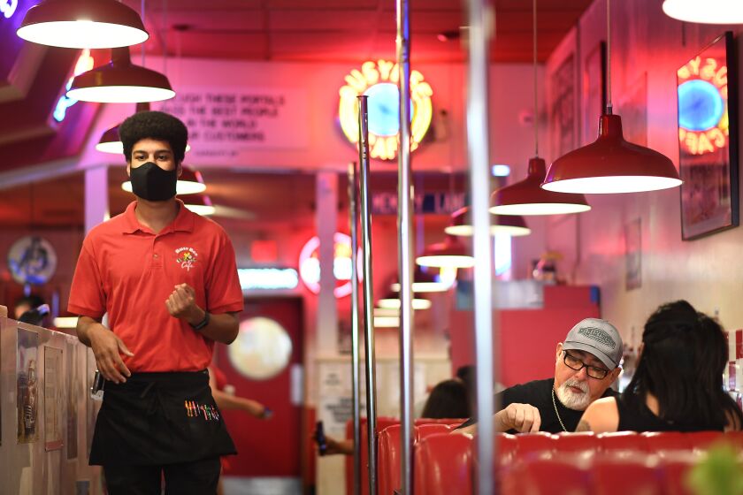 VENTURA, CALIFORNIA MAY 23, 2020-Diners enjoy a meal at BusyBee 50's Cafe in Ventura Saturday. The county lifted a lockdown for sit down dining at all restaurants.(Wally Skalij/Los Angeles Times)