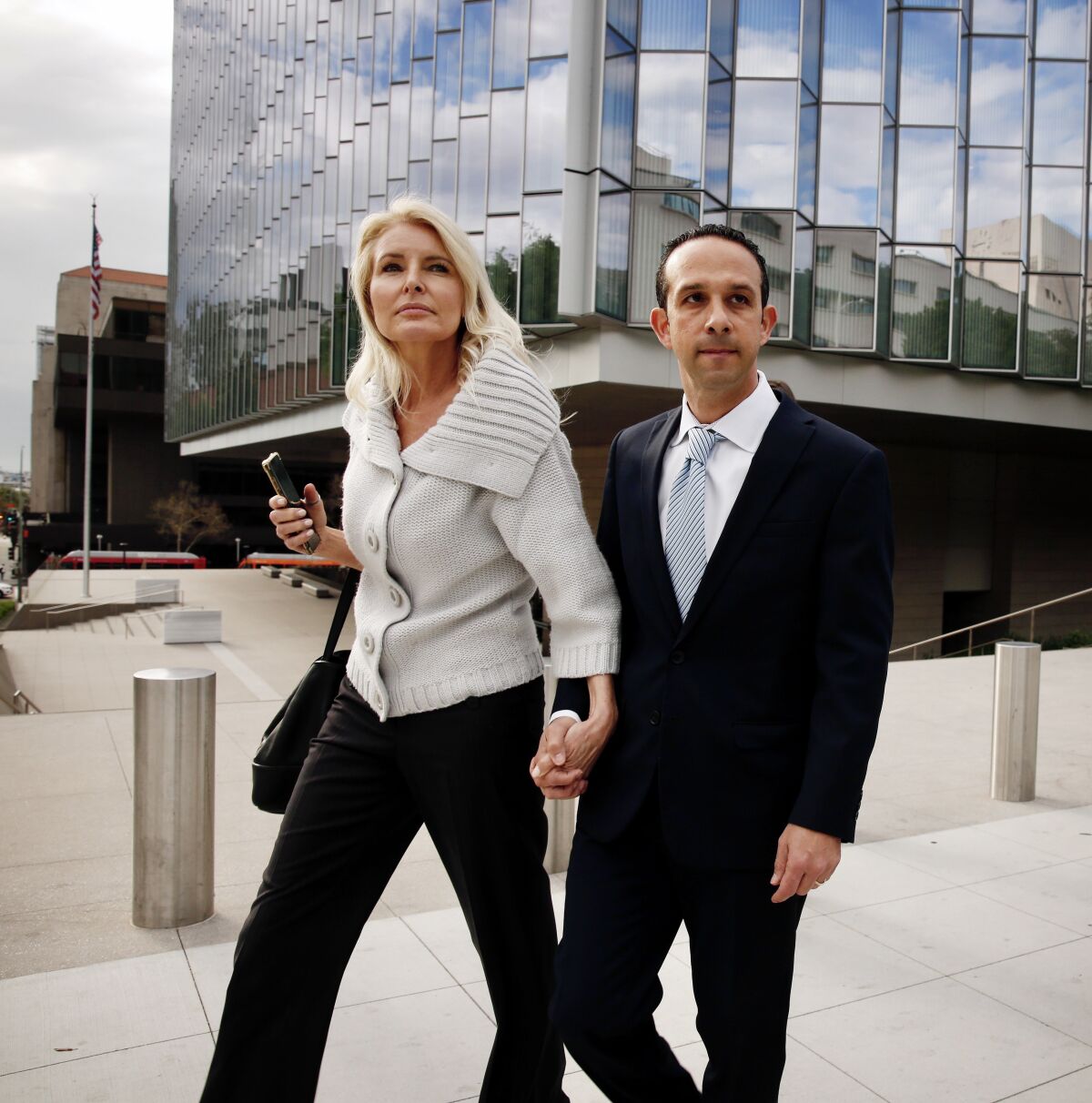 Former Los Angeles City Councilman Mitchell Englander leaves federal court in downtown Los Angeles with his wife, Jayne, in mid-March.