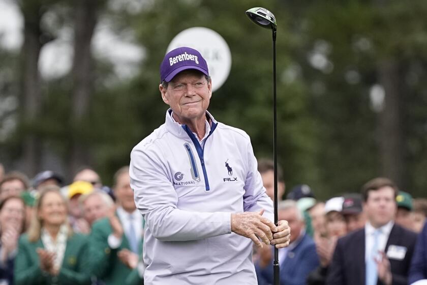 Honorary starter Tom Watson hits the ceremonial tee shot in the first hole during the first round.