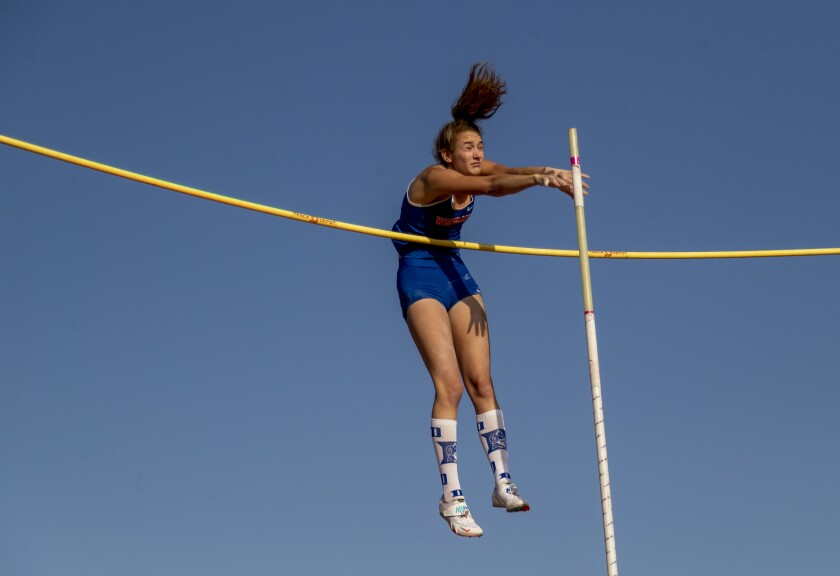 Westlake's Paige Sommers touches the bar in the pole vault