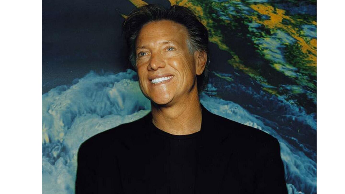 Dallas Raines, at the American Meteorological Society meeting in 2003, is chief meteorologist at KABC-TV in Los Angeles.