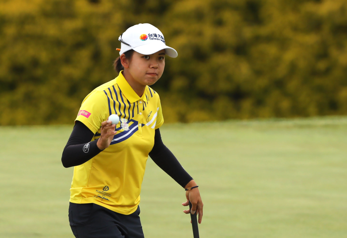 Wei-Ling Hsu waves to the crowd on the 18th green during the third round of the Pure Silk Championship in Williamsburg, Va.