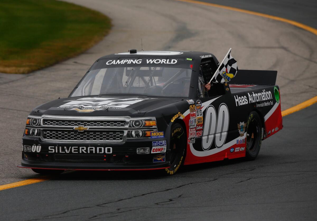Cole Custer celebrates after winning the NASCAR Camping World Truck Series UNOH 175 on Saturday at New Hampshire Motor Speedway.