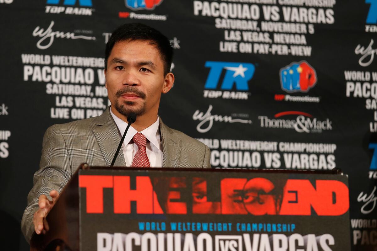 Manny Pacquiao speaks during a news conference at the Beverly Hills Hotel on Thursday.