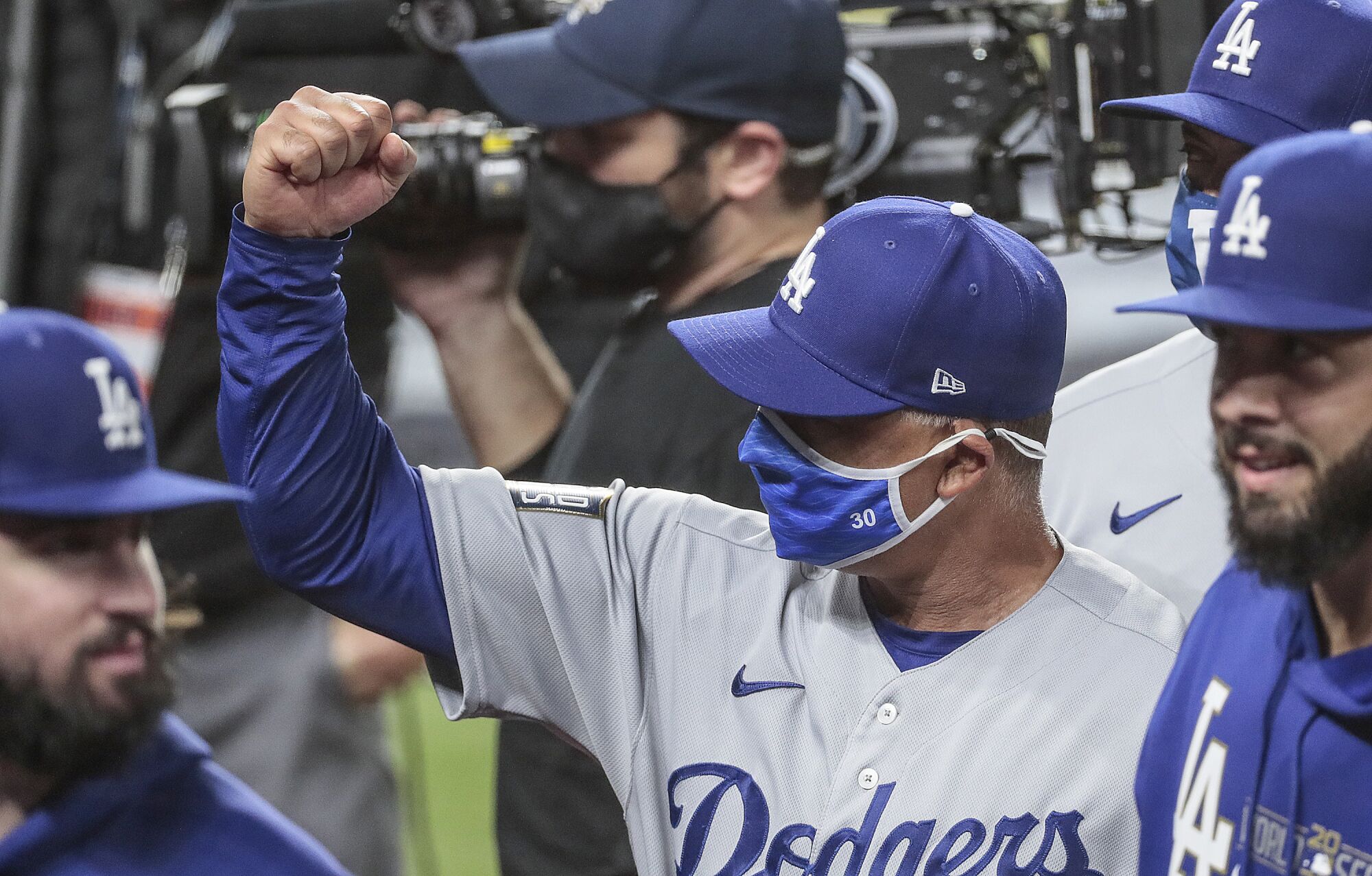 Dodgers manager Dave Roberts celebrates a 6-2 win over the Tampa Bay Rays in Game 3 of the World Series.
