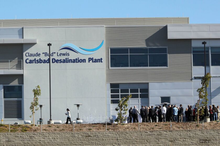 The Claude "Bud" Lewis Desalination Plant, named after Carlsbad's late mayor, was dedicated Monday with plenty of water for dignitaries and guests.