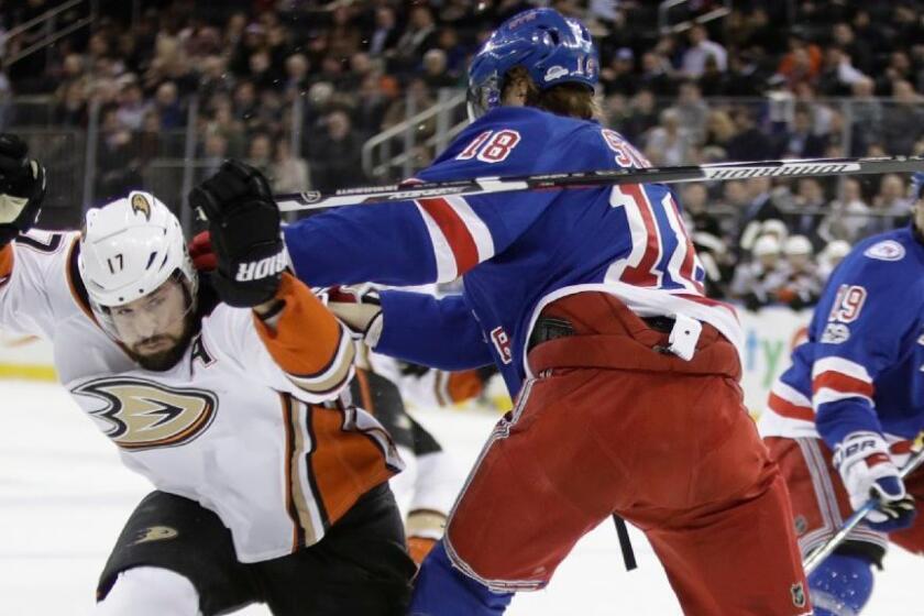Ducks center Ryan Kesler evades Rangers defenseman Marc Staal during the first period of a game in New York on Feb. 7.