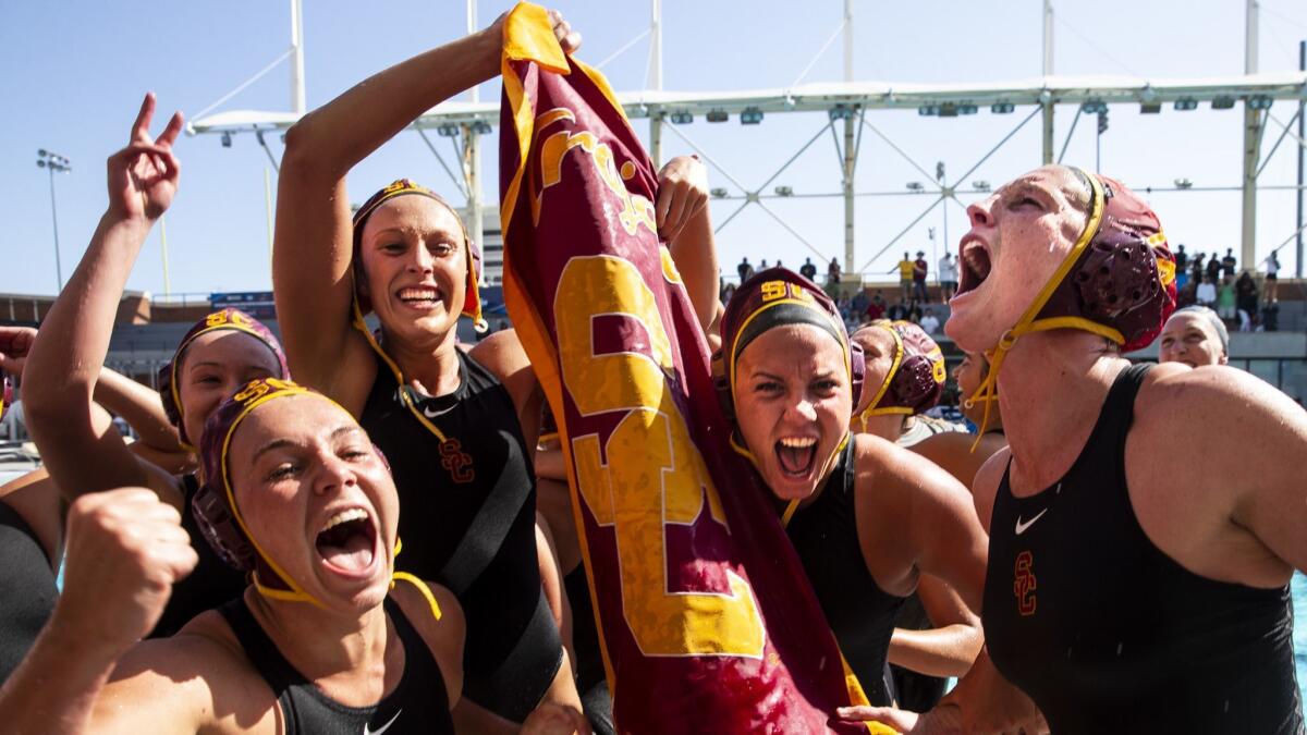 The USC women's water polo team celebrates after defeating Stanford and winning the NCAA women's water polo championship at Uytengsu Aquatics Center on May 13, 2018.