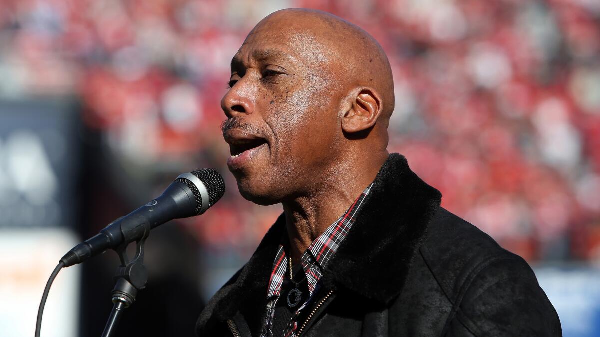 Recording artist Jeffrey Osborne sings the national anthem before a game between the San Francisco 49ers and Seattle Seahawks at Candlestick Park in December. Osborne has been a national anthem singer at Lakers home games for more than three decades.