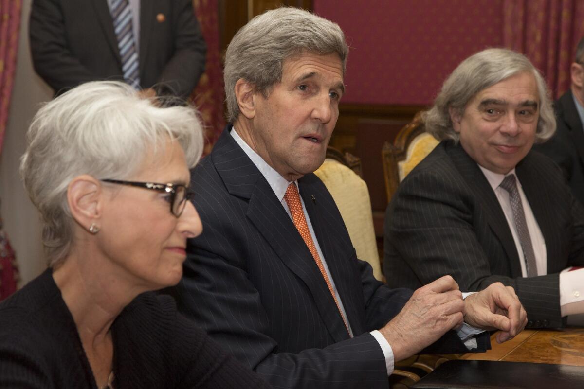 Secretary of State John Kerry with Under Secretary for Political Affairs Wendy Sherman and Secretary of Energy Ernest Moniz at the negotiating table Thursday.